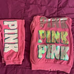 women’s pink set of sweatpants and zip up